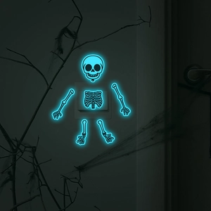 Luminous Halloween skeleton wall sticker glowing in the dark around a light switch decor