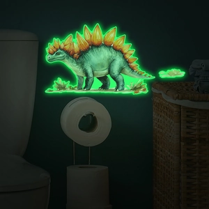 Glow-in-the-dark stegosaurus wall sticker in a bathroom setting with neon green light