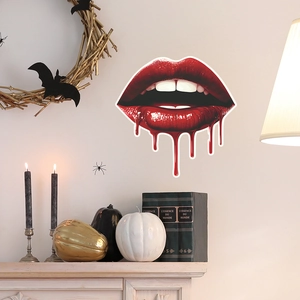Détail de l'autocollant lèvre sanglante avec chauves-souris et citrouilles décoratives