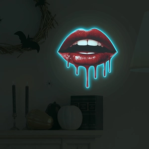 Néon en forme de lèvres rouges avec contour bleu et effet goutte pour décoration murale