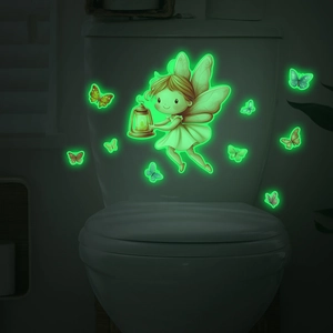 Luminous wall sticker featuring a small fairy and butterflies with glow in the dark effect