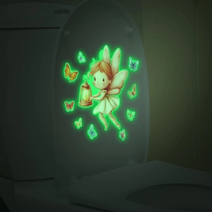 Glow-in-the-dark wall stickers featuring a luminous fairy with lantern and flying butterflies