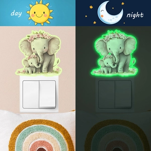 Luminous elephant wall switch sticker showing day and night glowing effect for home decor