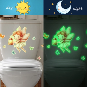 Luminous fairy with lantern and butterflies wall decal showing day and night glowing effect