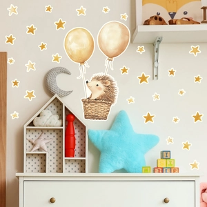 Luminous wall decal with a hedgehog in a hot air balloon and yellow stars for nursery decor