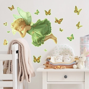 Detail of sleeping fairy wall decal with colorful butterflies in a nursery room