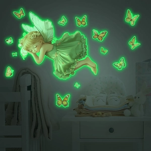 Luminous wall stickers featuring a sleeping fairy and glowing butterflies in dark room