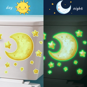 Luminous moon and stars wall stickers for bathroom decor shown in day and night contrast