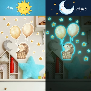 Luminous wall sticker featuring cartoon hedgehog in hot air balloon with night glow stars