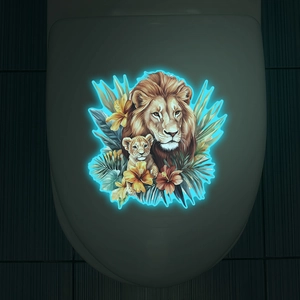 Glow-in-the-dark lion father and cub wall sticker with tropical hibiscus on toilet lid