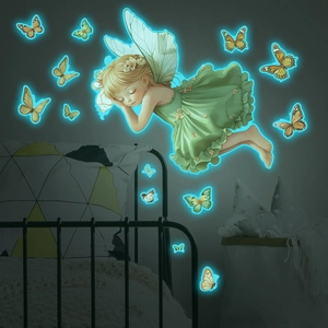 Luminous wall sticker showing a sleeping fairy and butterflies glowing in the dark