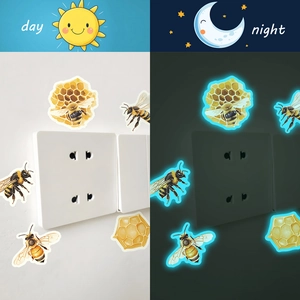 Luminous bee and honeycomb stickers showing day yellow and night blue glowing effect