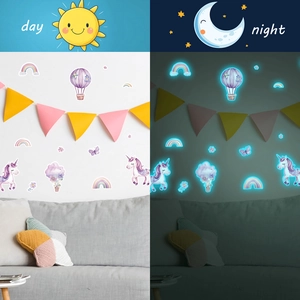 Luminous unicorn and hot air balloon wall decals showing day and night glow effect
