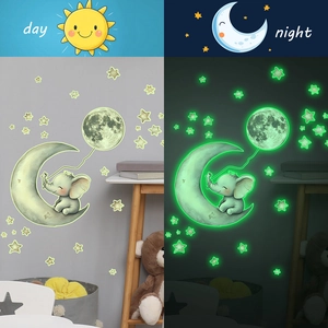 Luminous elephant moon stars wall decals showing day and night glowing effects