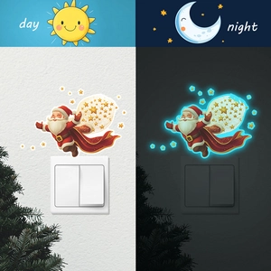 Luminous Santa Claus wall sticker showing glowing effect in the dark for light switches