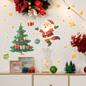 Detailed view of luminous Christmas wall stickers featuring Santa, tree, and stars on a home wall