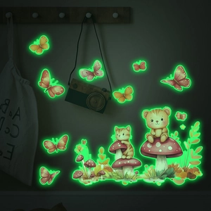 Luminous wall stickers featuring cartoon bear, cat and mushrooms in a dark bedroom setting