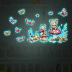 Luminous wall stickers showing glowing blue butterflies and cute animals in the dark