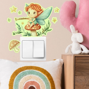 Detailed view of glow-in-the-dark elf and mushroom wall stickers around a light switch