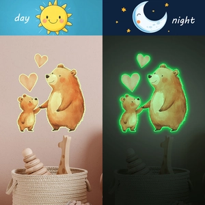 Luminous brown bear wall decals for nursery, showing glowing day and night effects