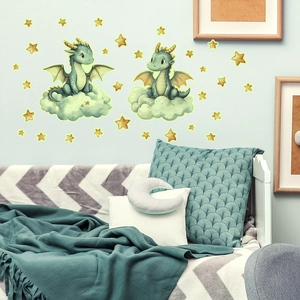 Green cartoon dinosaurs sitting on clouds with stars wall sticker in a cozy nursery bedroom