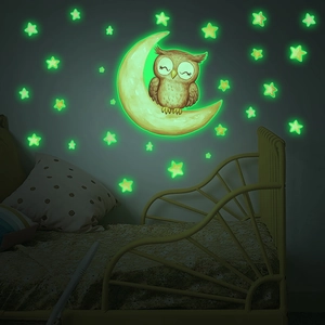 Luminous wall stickers set featuring a cartoon owl on moon with many glowing stars