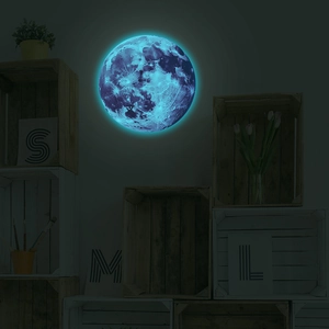 Detailed macro view of glowing blue moon wall sticker with realistic lunar texture