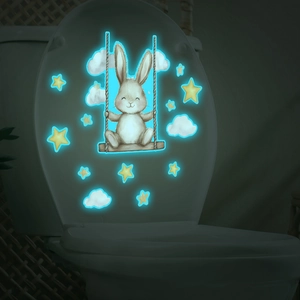 Sticker mural lapin sur balançoire fluorescent avec étoiles pour déco salle de bain