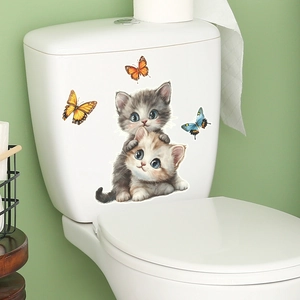 Lively cute cat and butterfly self-adhesive decals applied on white toilet tank
