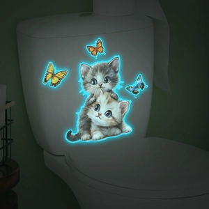 Luminous toilet stickers featuring cute cartoon cats and butterflies with blue glow effect