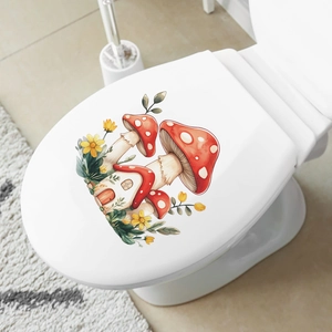 Adesivo colorato con casa a fungo su sedile WC bianco per decorazione del bagno