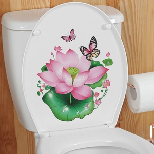 Pink lotus flower and butterfly waterproof PVC wall decal on a white toilet cover