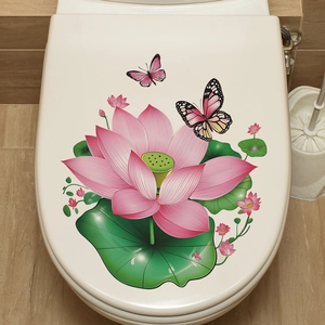 Waterproof lotus and butterfly stickers applied to a white toilet lid in a bathroom