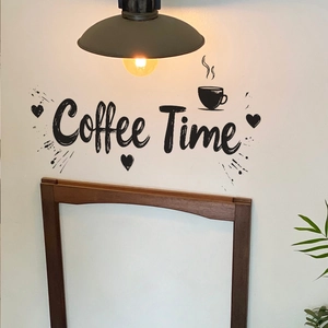 Coffee Time wall sticker with cup and heart decor on white wall under warm lamp light