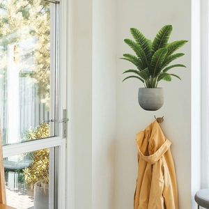 Self-adhesive green palm plant wall sticker with gray cement pot in Nordic home style