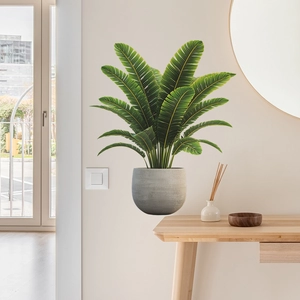 Vibrant green cycad plant wall sticker with gray frosted pot for home decoration