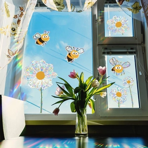 Rainbow prism suncatcher window stickers with cartoon bees and geometric floral patterns