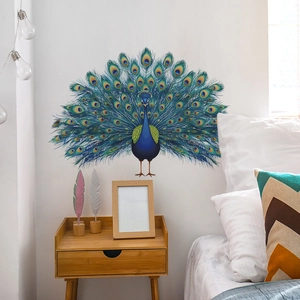 Vibrant blue peacock wall decal with colorful feathers for modern bedroom wall decor