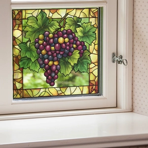Stained glass window film with purple grape cluster and mosaic geometric frame pattern