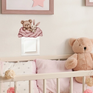 Cute bear and rabbit light switch sticker for nursery decor in warm nursery setting