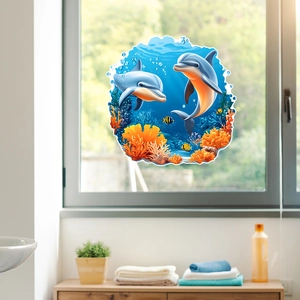 Cartoon blue dolphins and coral reef ocean wall stickers on a bright bathroom window
