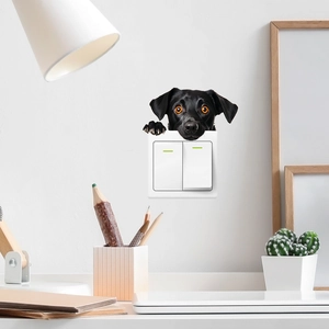 Autocollant mural chien noir mignon pour décoration d'interrupteur dans le salon