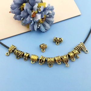 Gedetailleerd overzicht van 120 vintage gouden zinklegering afstandskraal met lussen voor DIY