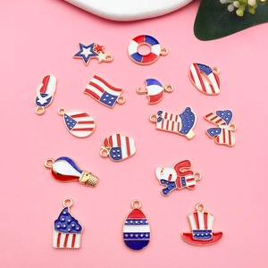 Flat lay of USA flag themed alloy charms including star, heart and balloon shapes