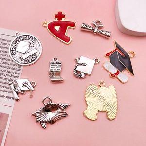 Colorful graduation charms with graduation caps and A+ medals for DIY jewelry making