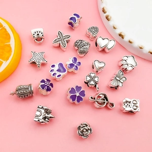 Pack de 20 abalorios vintage de aleación de plata para joyería DIY con esmalte lila