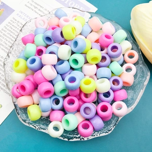 Macro shot of colorful pastel macaron pony beads for DIY craft and jewelry making