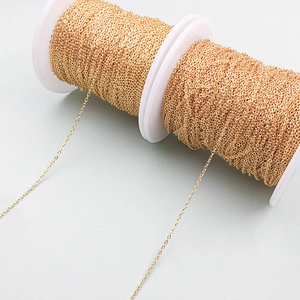 Close-up of 18K gold plated copper chain roll for DIY jewelry making and crafts