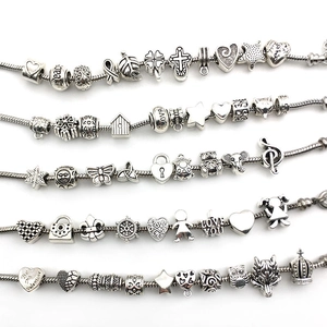Set de dijes vintage de plata para joyas DIY incluyendo corazones y varios animales