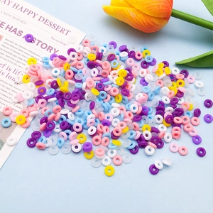 Macro view of assorted 6mm colorful silicone beads for DIY bracelet jewelry making